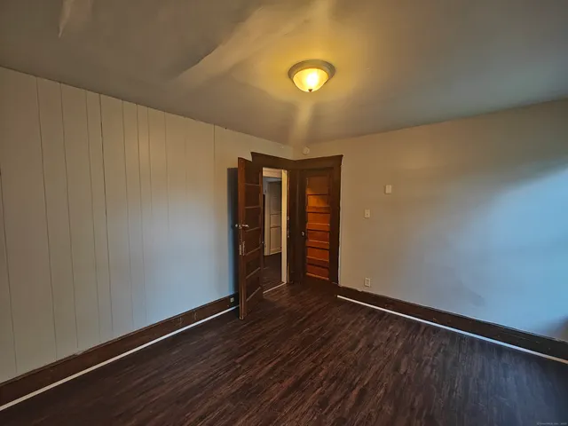 a view of livingroom with wooden floor