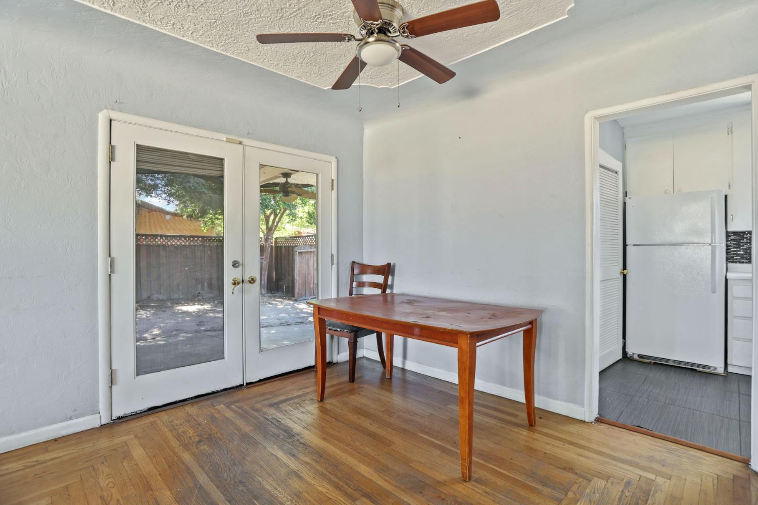 916 Elm Avenue Modesto, CA 95351 - Photo 12 of 52 13. Dining nook with backyard doors A sweet dining spot with backyard access — perfect for coffee, dinner, or pretending you’re only going outside for “one quick thing.”