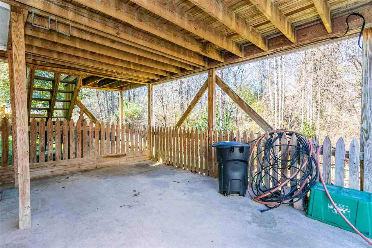 4233 Fowler Ridge Drive Raleigh, NC 27616 - Photo 24 of 28 Paved area below screened porch just off the garage. Great patio area Patio