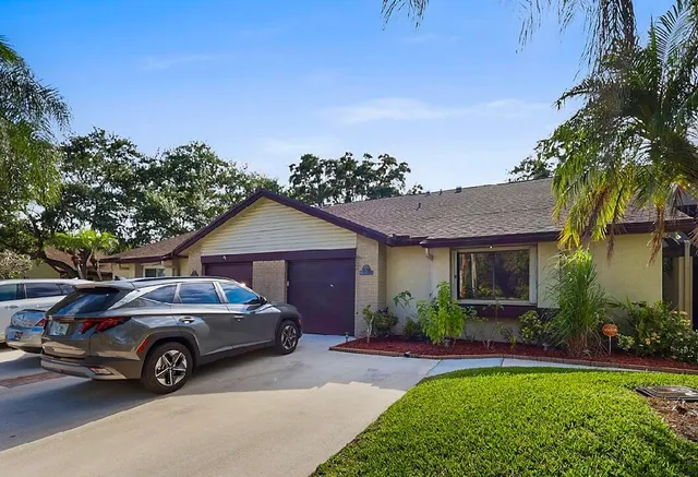 a car parked in front of a house