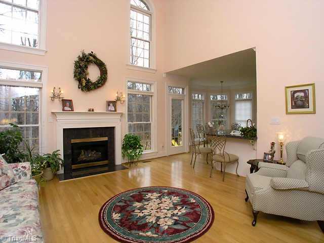 6116 Chalet Drive Oak Ridge, NC 27310 - Photo 3 of 9 Other. Soaring ceilings, bright and open with gas log fireplace, this living room has it all.