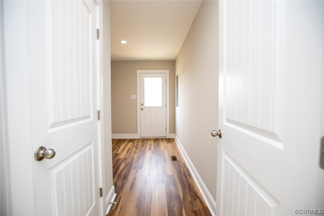 4086 Pin Oak Road Prospect, VA 23960 - Photo 18 of 44 a view of a hallway with wooden floor