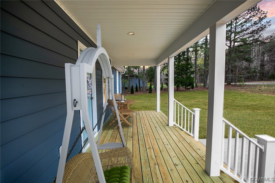 4086 Pin Oak Road Prospect, VA 23960 - Photo 2 of 44 a view of balcony with wooden floor and fence