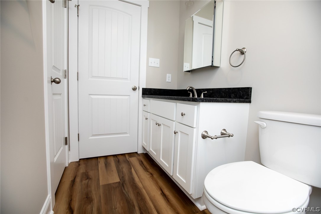 4086 Pin Oak Road Prospect, VA 23960 - Photo 28 of 44 a bathroom with a toilet and a mirror