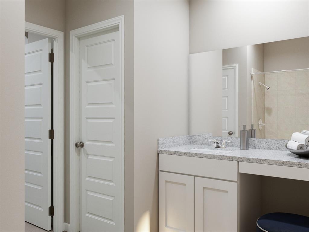 101 Manchester Drive Cleburne, TX 76031 - Photo 19 of 30 a bathroom with a sink and a mirror