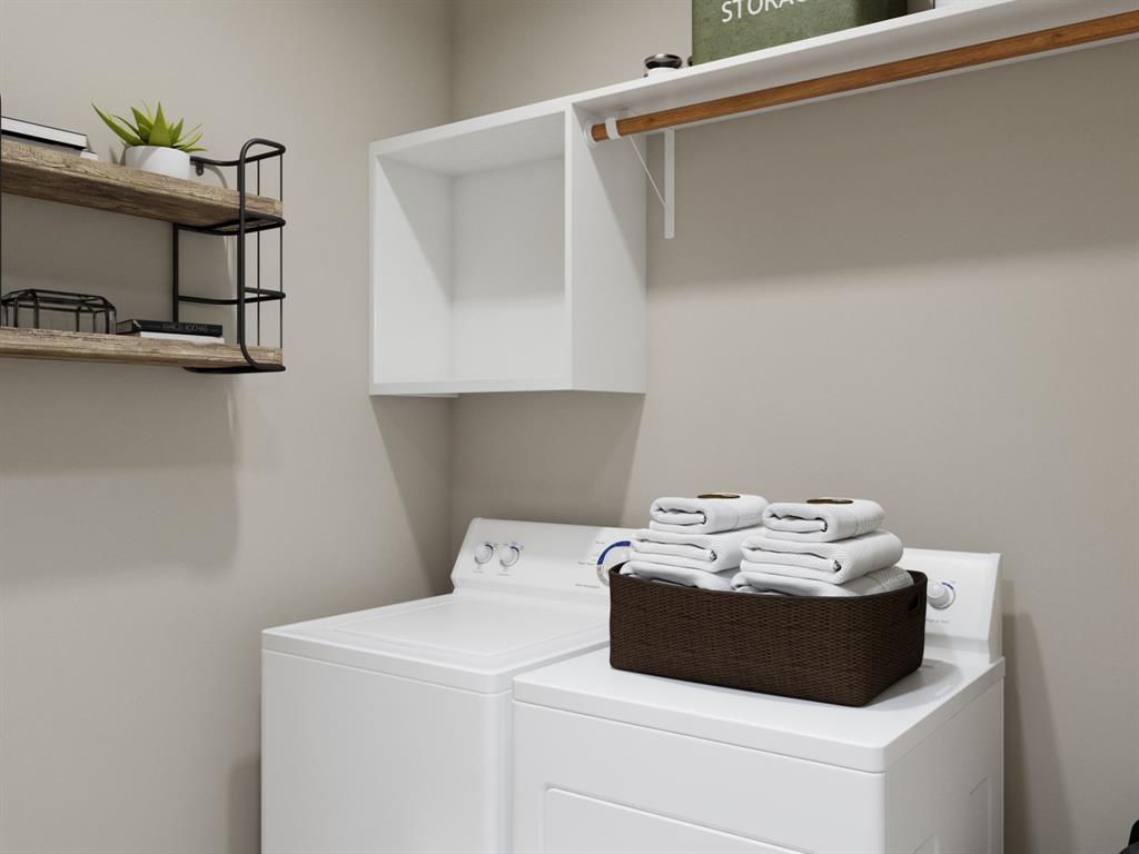 101 Manchester Drive Cleburne, TX 76031 - Photo 22 of 30 a utility room with a washer and dryer