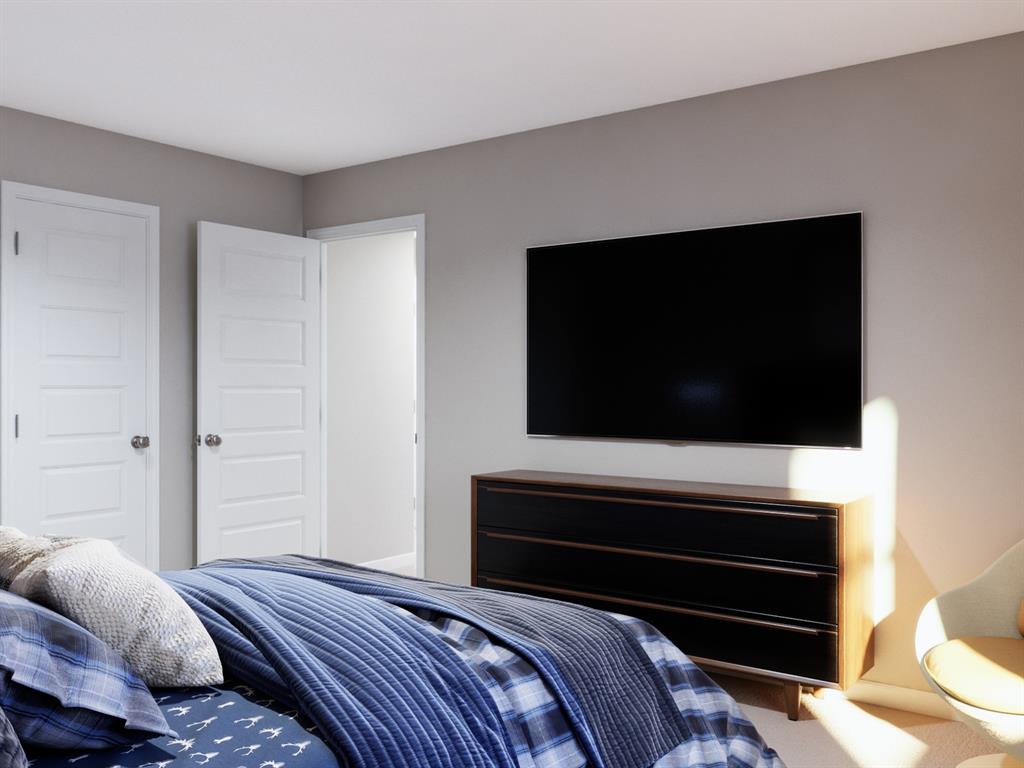 101 Manchester Drive Cleburne, TX 76031 - Photo 26 of 30 a bedroom with a bed and flat screen tv