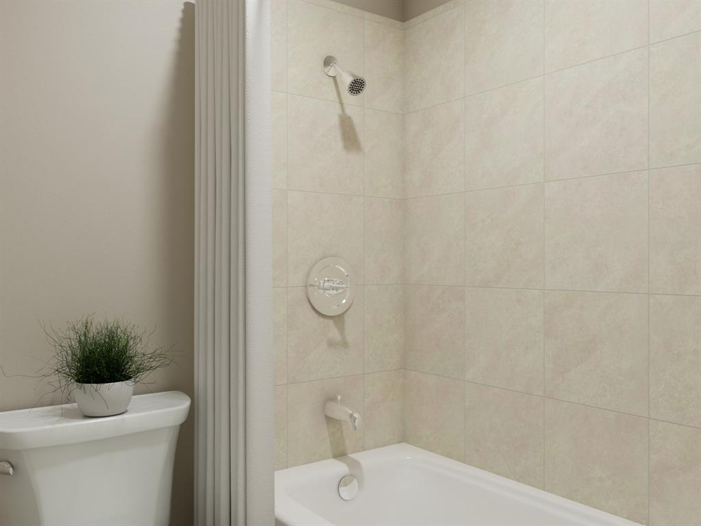 101 Manchester Drive Cleburne, TX 76031 - Photo 30 of 30 a bathroom with a sink a toilet and shower