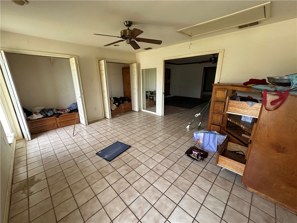 417 Linnet Courts Corpus Christi, TX 78418 - Photo 14 of 20 a bedroom with furniture and a window