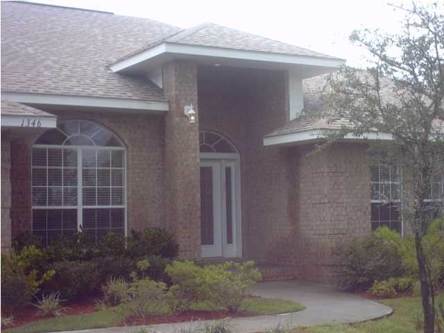 1346 Driftwood Point Road Santa Rosa Beach, FL 32459 - Photo 1 of 5 a view of a house with a yard