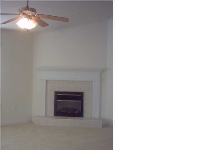 1346 Driftwood Point Road Santa Rosa Beach, FL 32459 - Photo 5 of 5 a living room with a fireplace
