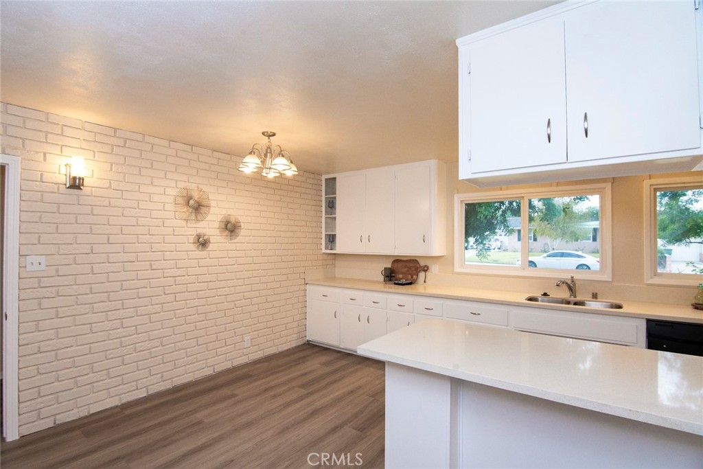 2983 Cheyenne Road Riverside, CA 92506 - Photo 11 of 49 a bathroom with a sink and a large mirror