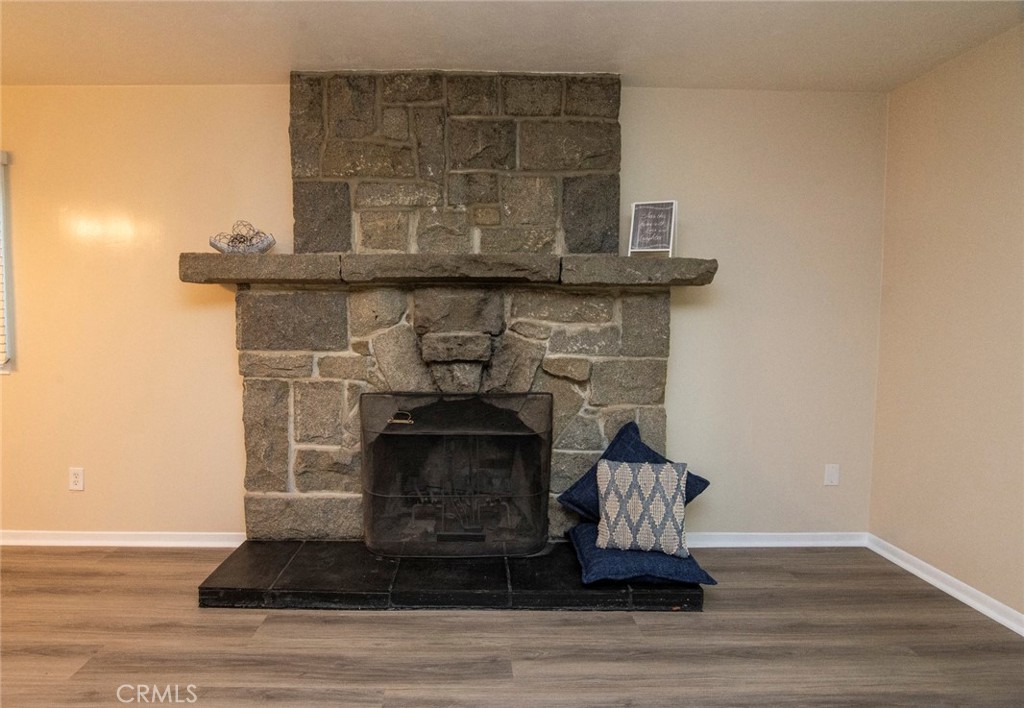 2983 Cheyenne Road Riverside, CA 92506 - Photo 15 of 49 a view of fireplace with wooden floor