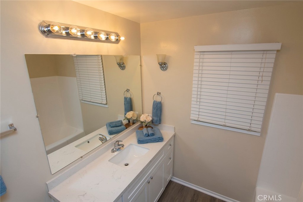 2983 Cheyenne Road Riverside, CA 92506 - Photo 25 of 49 a bathroom with a sink a vanity and a mirror