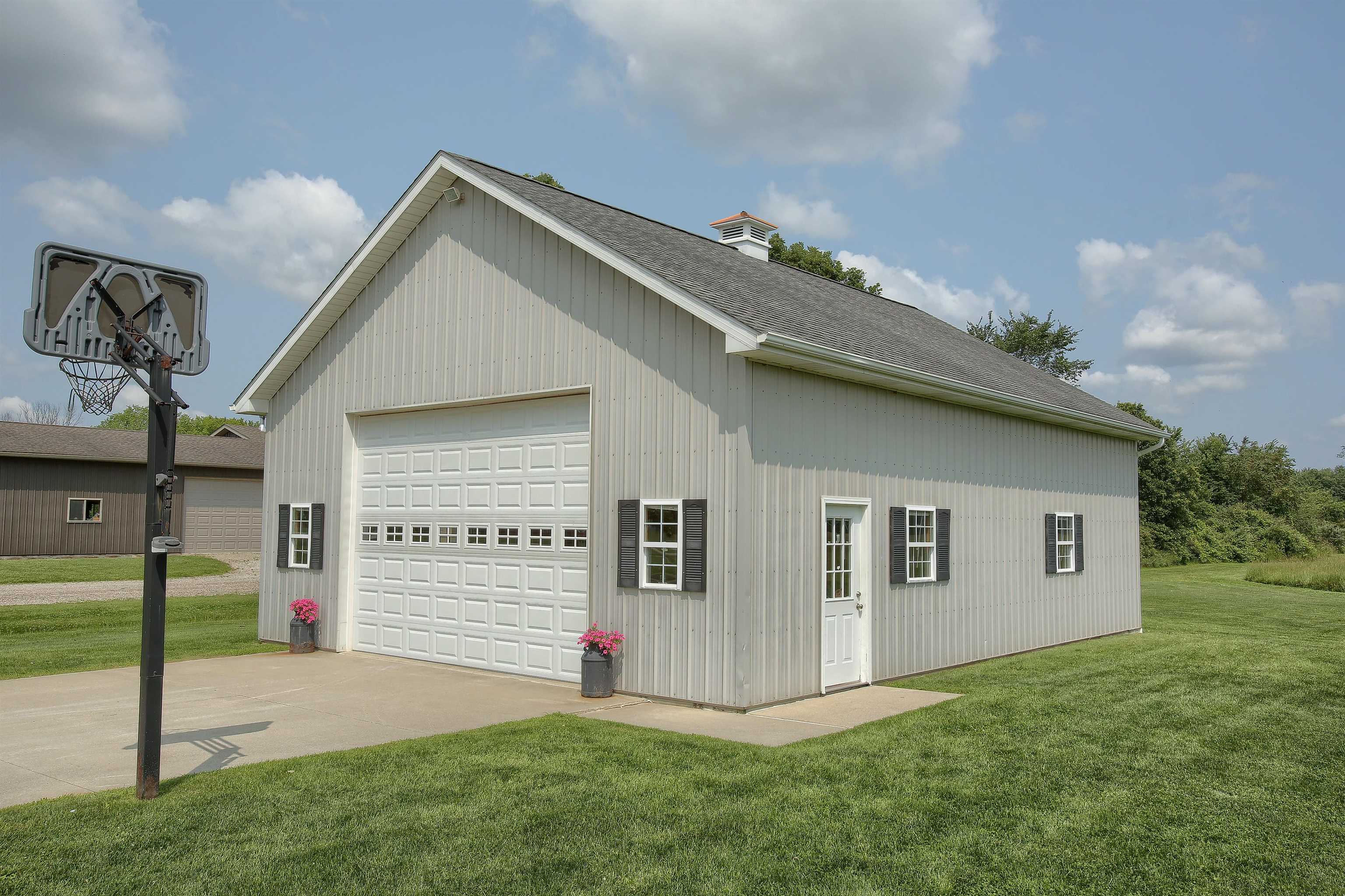 7372 Springborn Road East China, MI 48054 - Photo 21 of 24 Features oversized door, heat & water along with 220 plug and loft