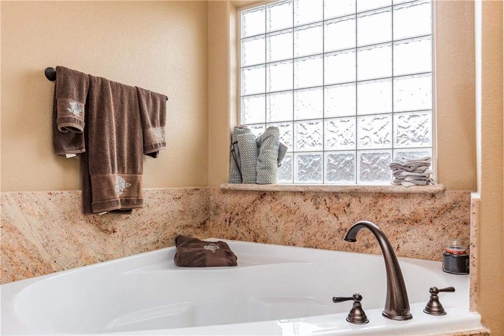 1306 Keenland Road Corpus Christi, TX 78418 - Photo 12 of 26 a bathroom with a sink and a window