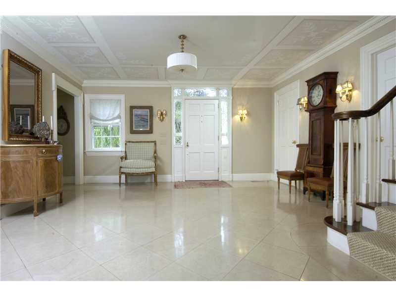 22 Perkins Road Greenwich, CT 06830 - Photo 2 of 16 a living room with furniture and a flat screen tv