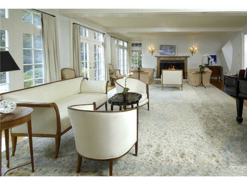 22 Perkins Road Greenwich, CT 06830 - Photo 4 of 16 a living room with furniture and large windows