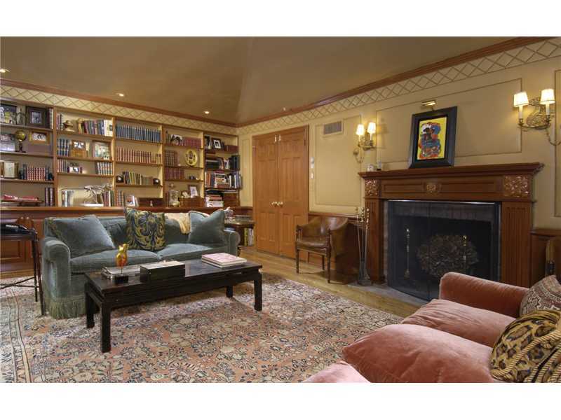 22 Perkins Road Greenwich, CT 06830 - Photo 5 of 16 a living room with furniture and a fireplace