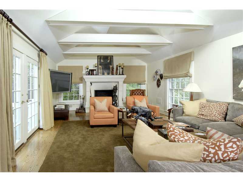 22 Perkins Road Greenwich, CT 06830 - Photo 8 of 16 a living room with furniture and a fireplace