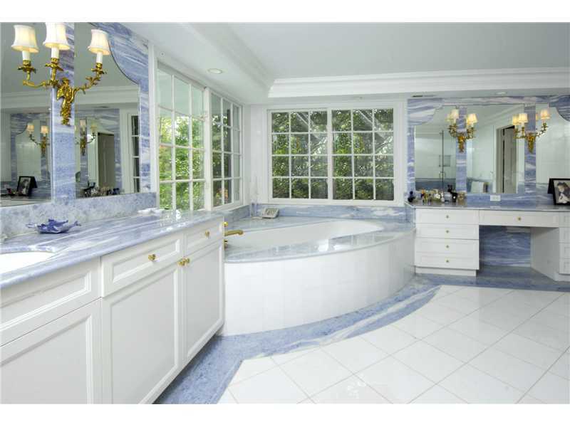 22 Perkins Road Greenwich, CT 06830 - Photo 9 of 16 a large white kitchen with a large window