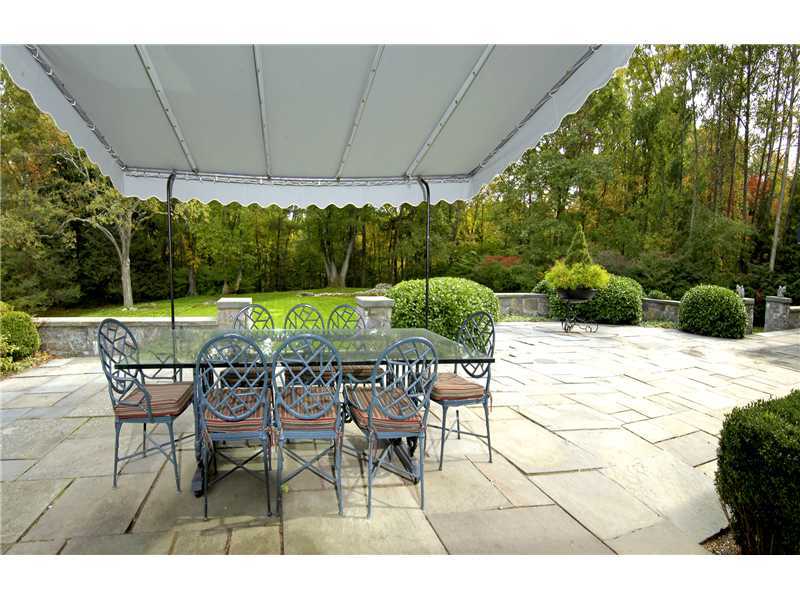 22 Perkins Road Greenwich, CT 06830 - Photo 10 of 16 a view of an outdoor space with furniture and table