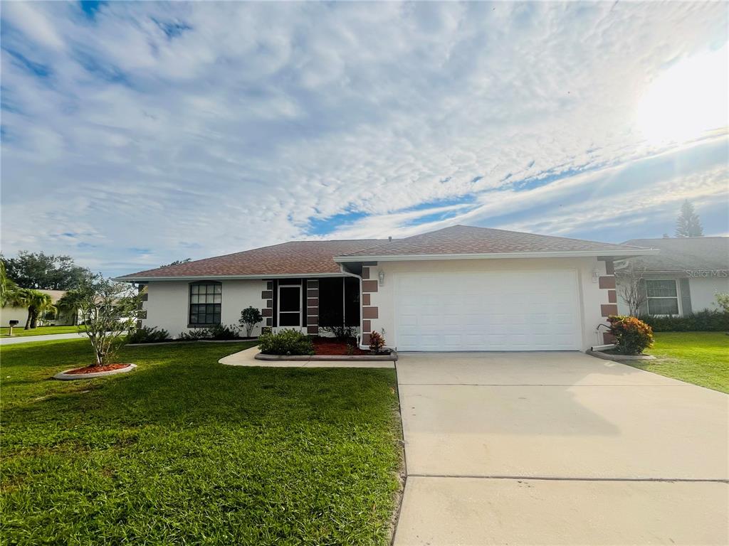 a front view of house with yard having outdoor seating