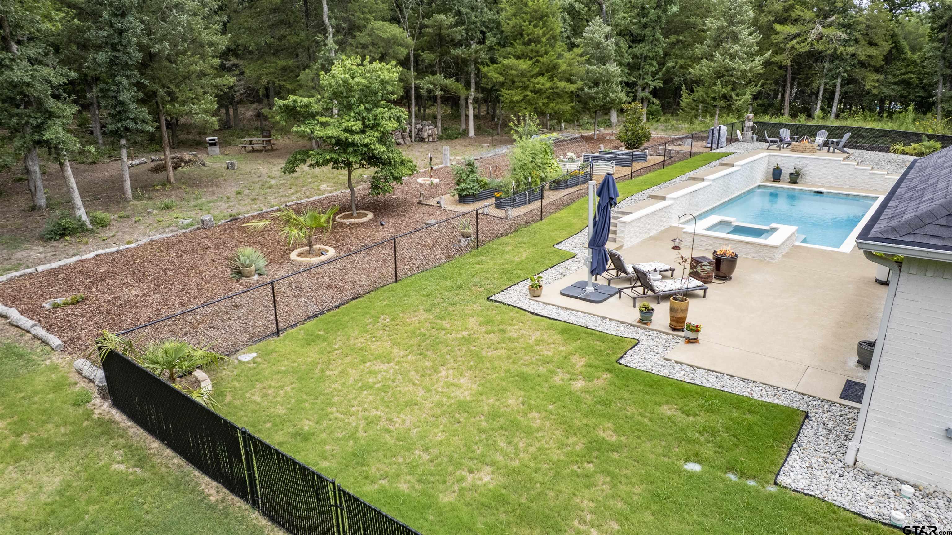 23316 Fm 1995 Lindale, TX 75771 - Photo 45 of 47 a view of a swimming pool with a patio