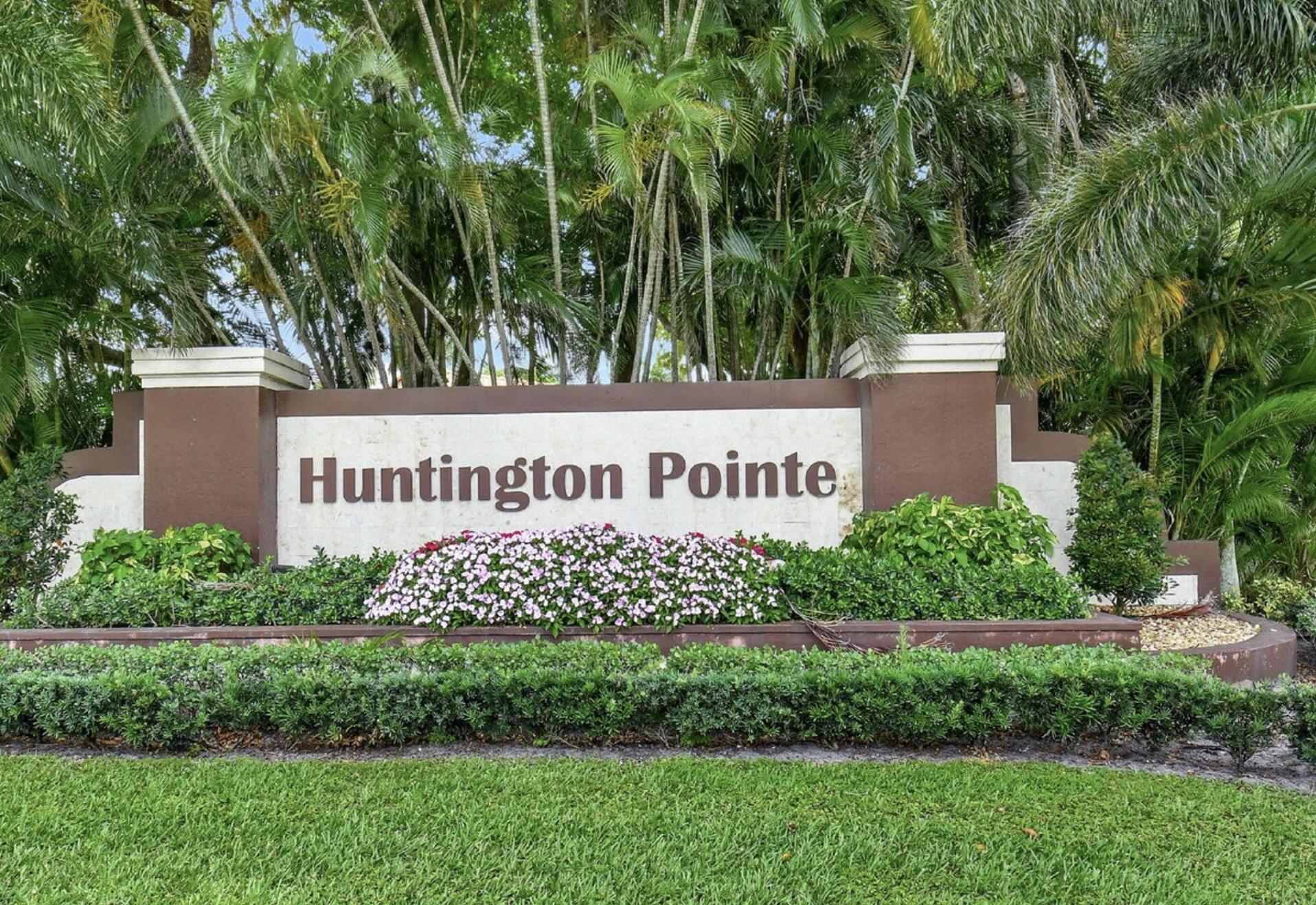 6356 Pointe Pleasant Circle, Unit G Delray Beach, FL 33484 - Photo 2 of 31 a sign on the side of a building