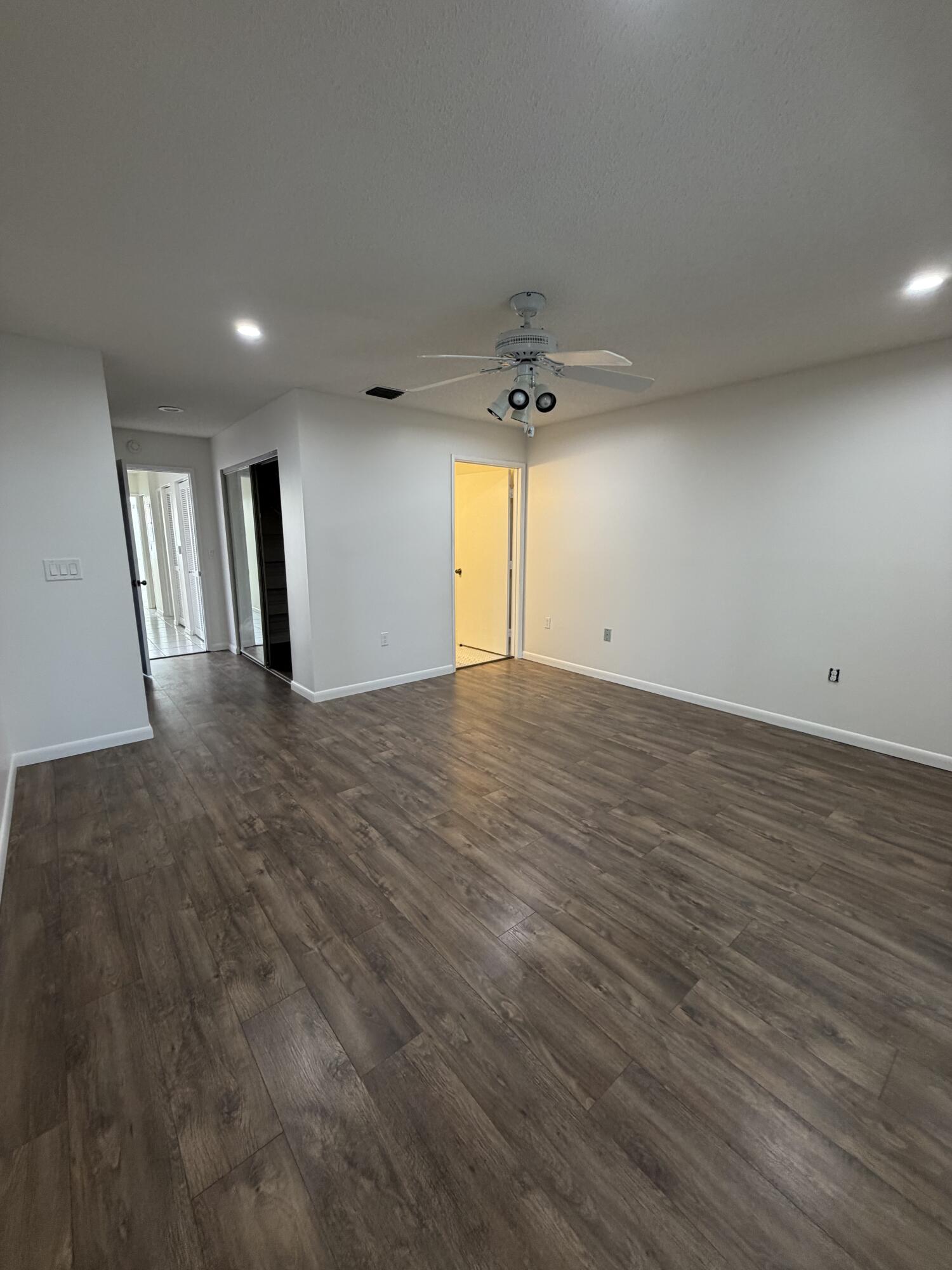 6356 Pointe Pleasant Circle, Unit G Delray Beach, FL 33484 - Photo 8 of 31 a view of an empty room