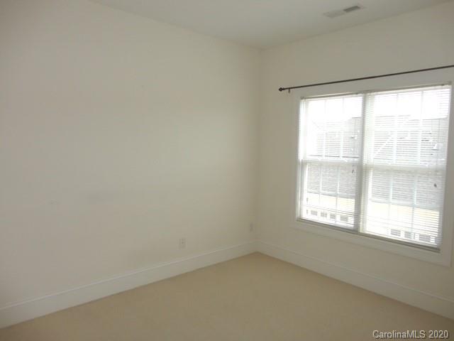 121 South Faulkner Way Davidson, NC 28036 - Photo 7 of 10 an empty room with a window