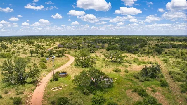a view of a house with large windows