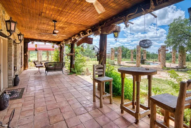 a outdoor space with lots of tables and chairs