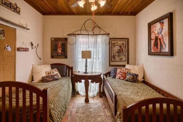 a large room with lots of furniture and a rug