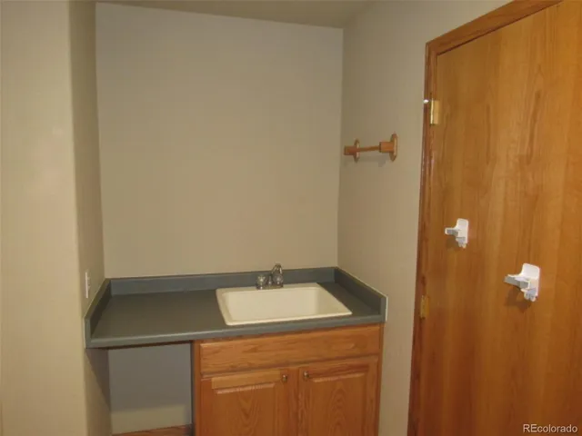 a bathroom with a sink and mirror