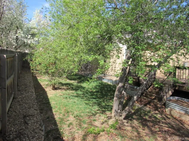 a view of a wooden deck with a bench