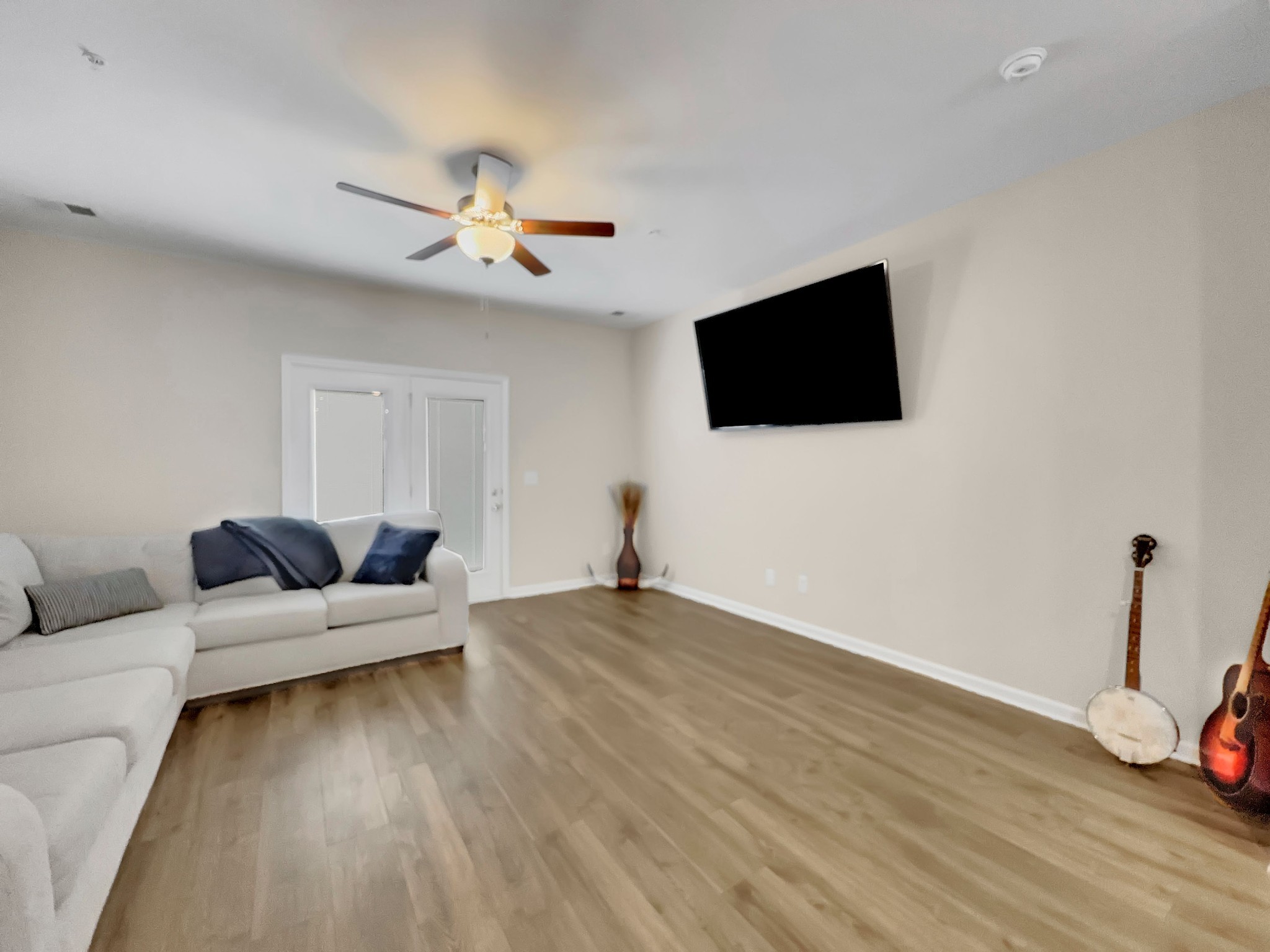 147 Addi Street Pleasant View, TN 37146 - Photo 8 of 27 a living room with furniture and a flat screen tv