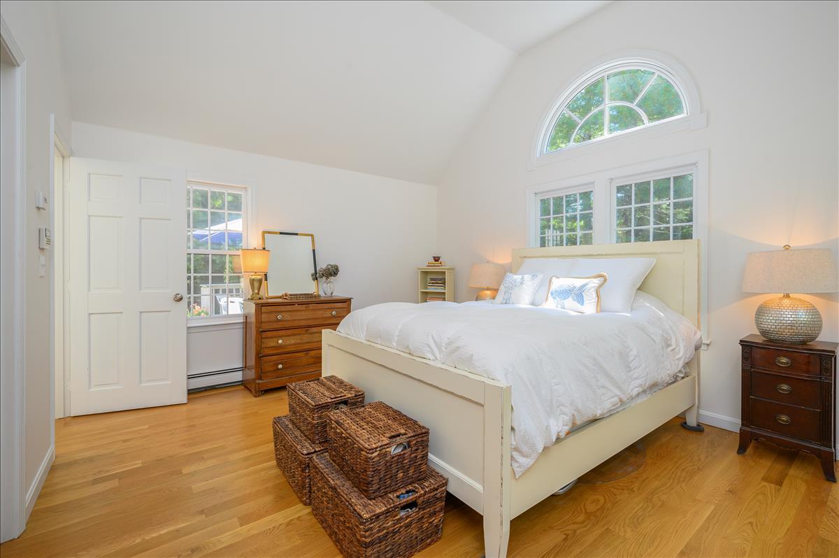 218 Hickory Hill Circle Osterville, MA 02655 - Photo 11 of 30 a bedroom with a bed and a cabinets