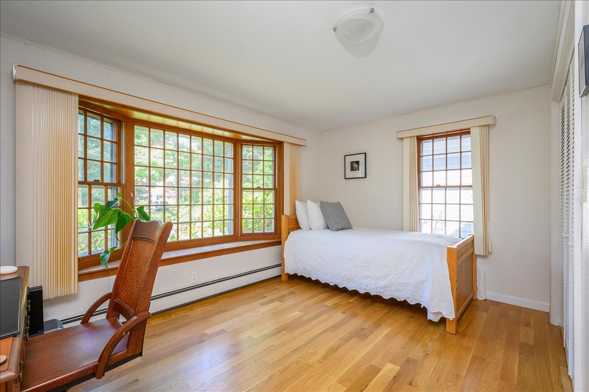 218 Hickory Hill Circle Osterville, MA 02655 - Photo 15 of 30 a bedroom with furniture and a large window