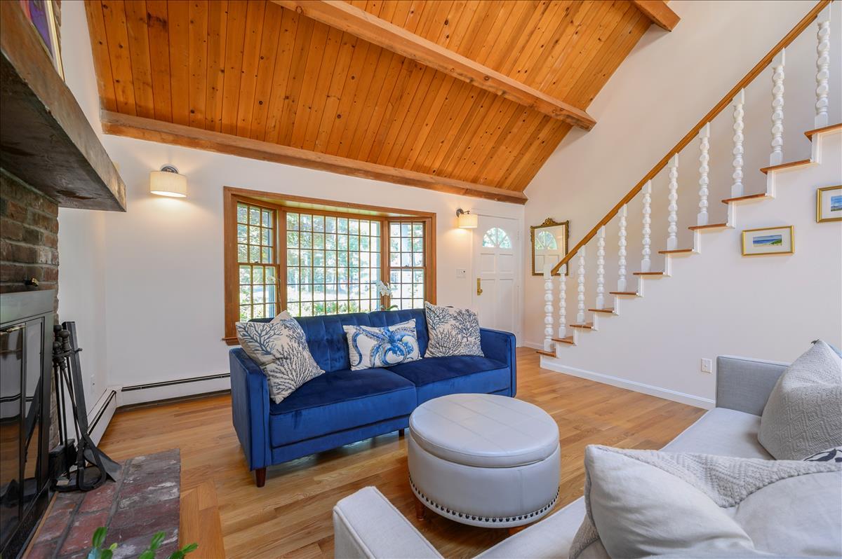218 Hickory Hill Circle Osterville, MA 02655 - Photo 2 of 30 a living room with furniture and a rug