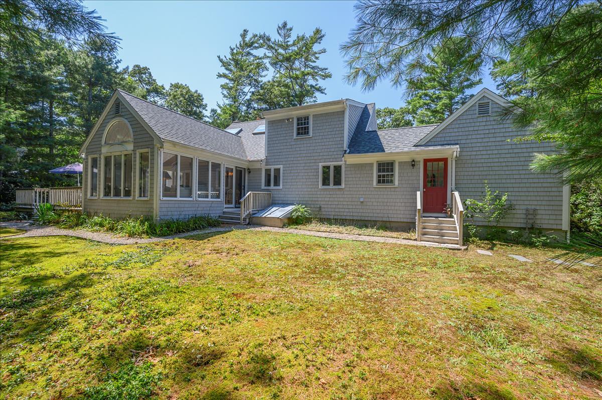 218 Hickory Hill Circle Osterville, MA 02655 - Photo 25 of 30 a front view of house with yard and trees around