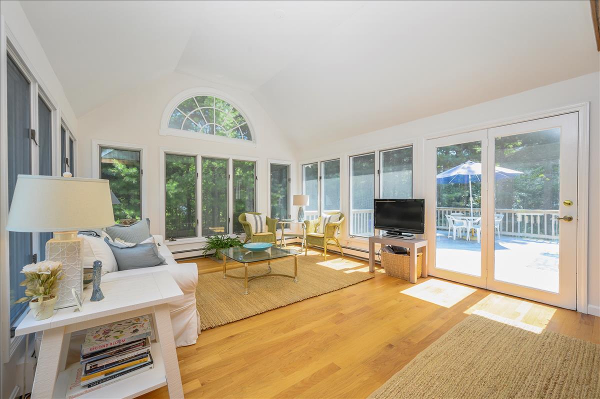 218 Hickory Hill Circle Osterville, MA 02655 - Photo 6 of 30 a living room with furniture and a flat screen tv