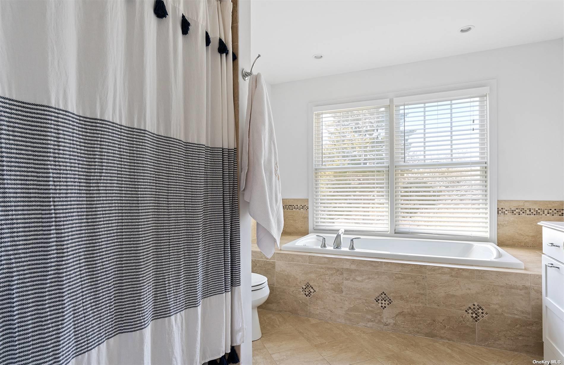 355 Midway Road Southold, NY 11971 - Photo 14 of 24 a view of a door and a window