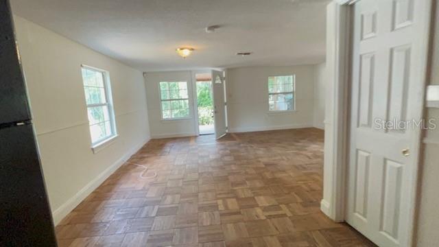 224 10th Avenue Ocoee, FL 34761 - Photo 10 of 14 a view of an empty room and window