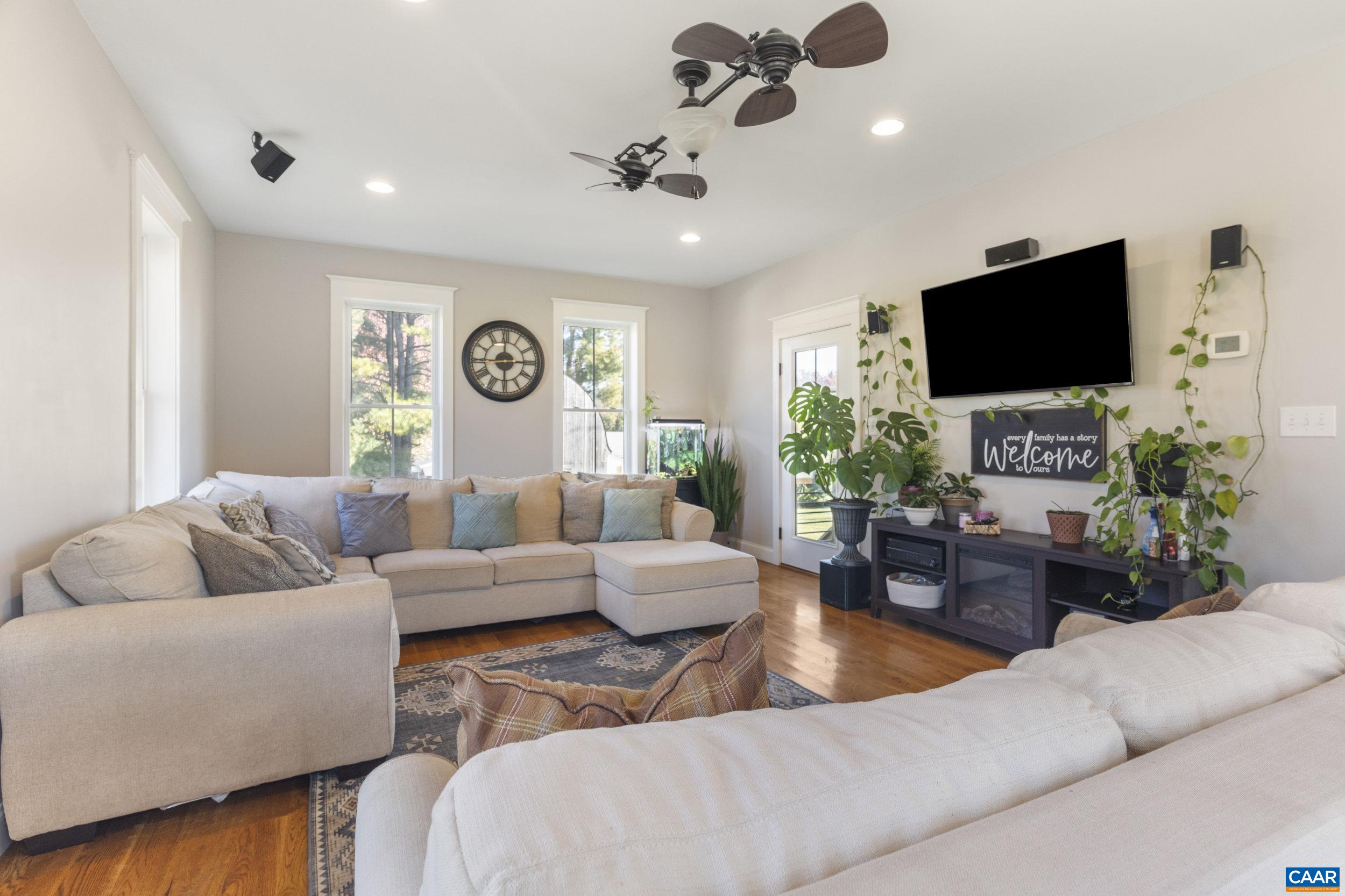 379 Crestview Drive Rustburg, VA 24588 - Photo 18 of 53 a living room with furniture and a flat screen tv