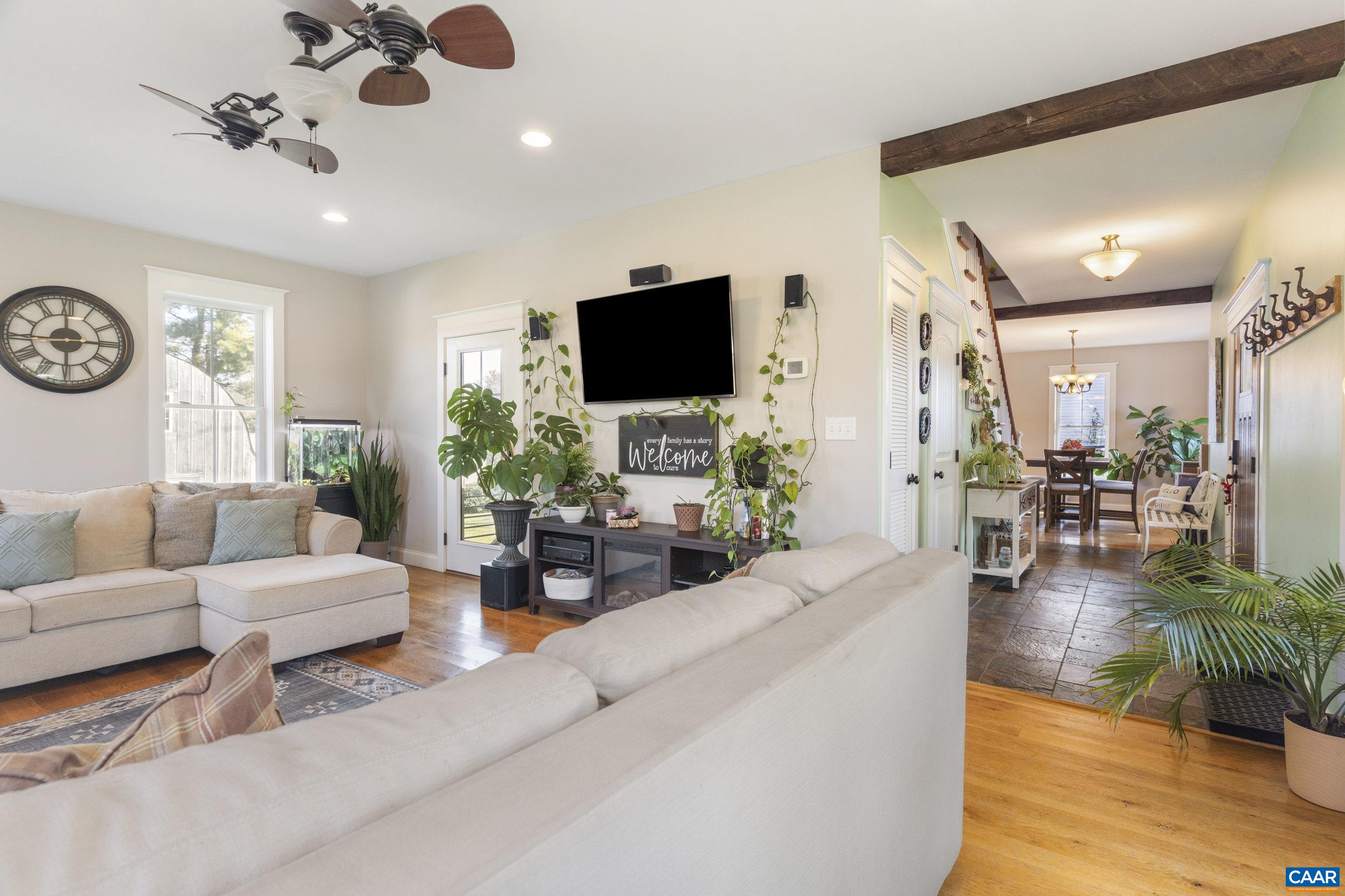 379 Crestview Drive Rustburg, VA 24588 - Photo 19 of 53 a living room with furniture and a flat screen tv