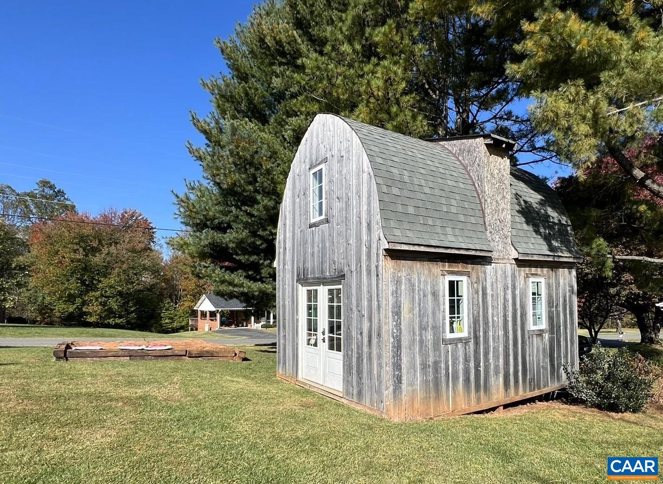 379 Crestview Drive Rustburg, VA 24588 - Photo 49 of 53 a view of a house with backyard and trees