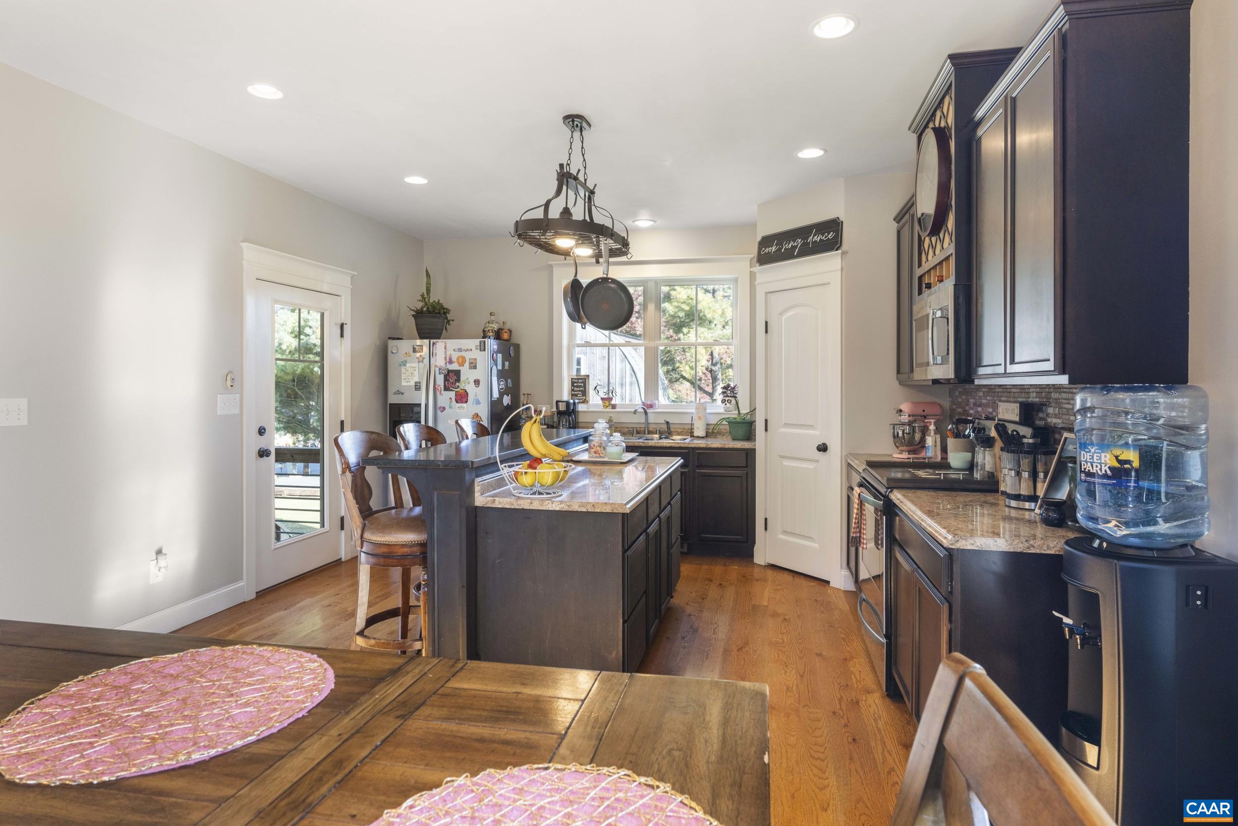 379 Crestview Drive Rustburg, VA 24588 - Photo 7 of 53 a view of a kitchen and dining room