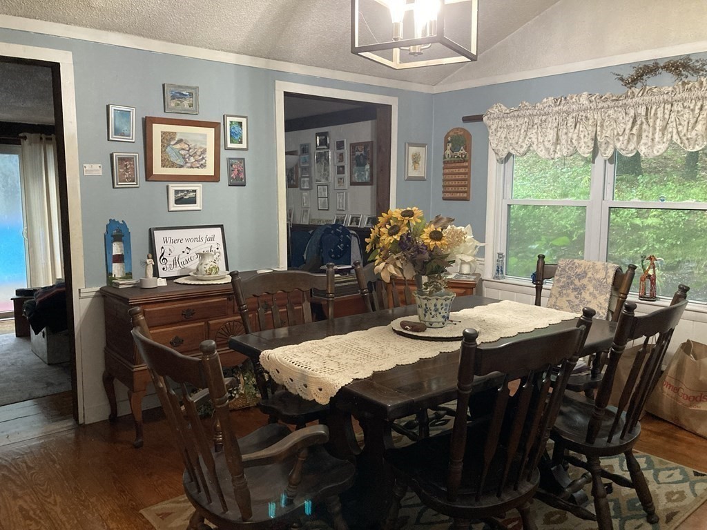 347 Main Street Boxford, MA 01921 - Photo 8 of 13 a view of a dining room with furniture window and wooden floor