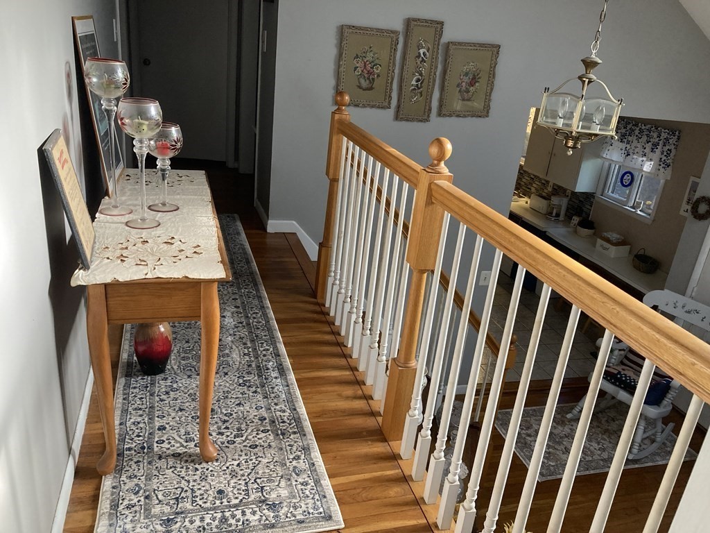 347 Main Street Boxford, MA 01921 - Photo 10 of 13 a view of a balcony and wooden floor
